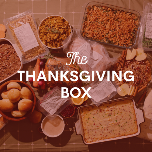 Image with Thanksgiving food with the text "The Thanksgiving Box" on top of the image.